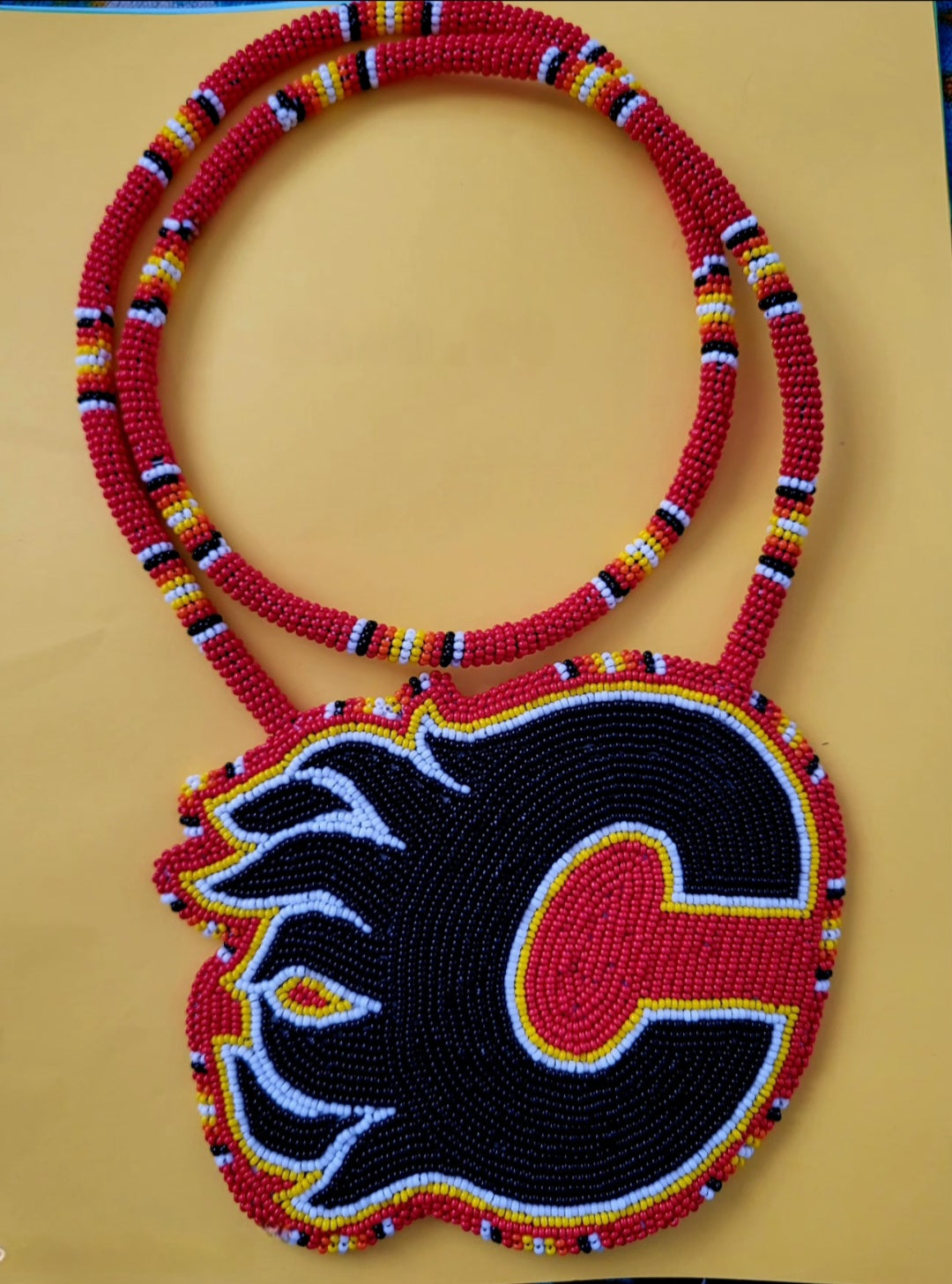 Danielle Redgun Flames Medallion